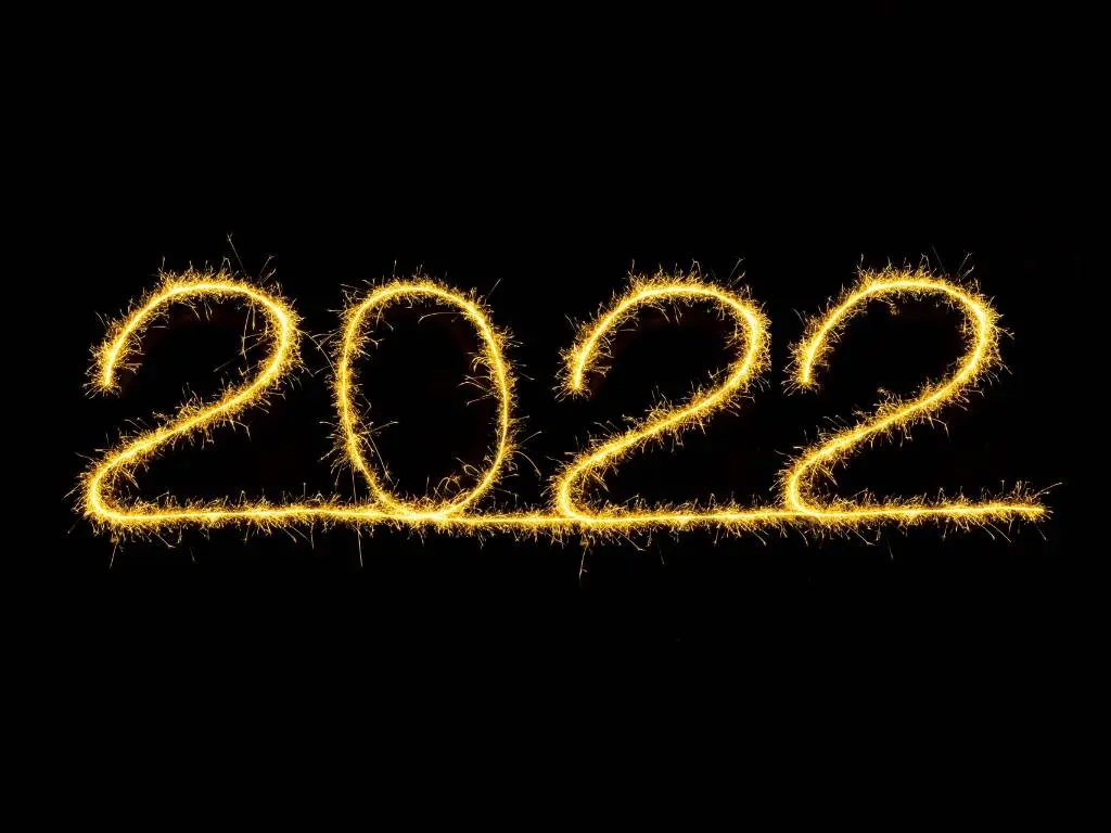2022 illuminated against dark background.